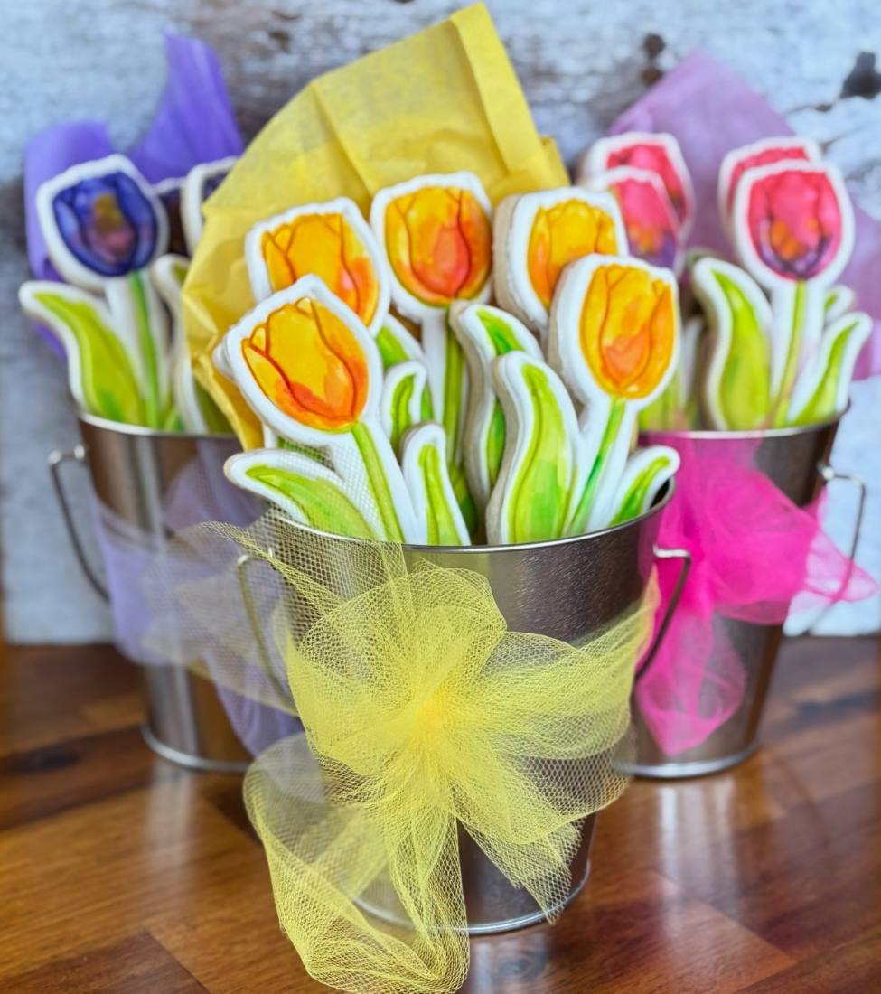 Hand-painted tulip sugar cookie bouquet in a tin pail